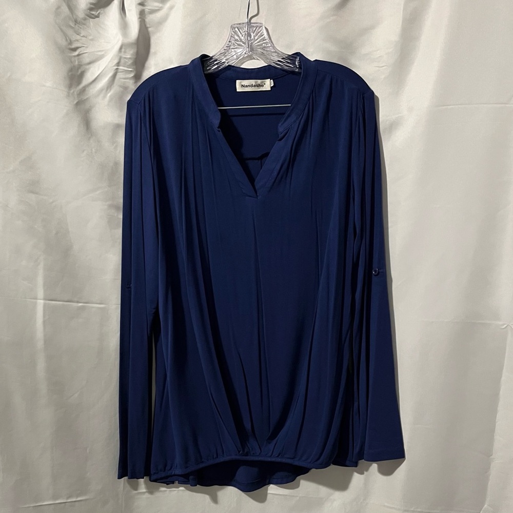 Navy blue women’s top.  Soft fabric and comfortable fit.